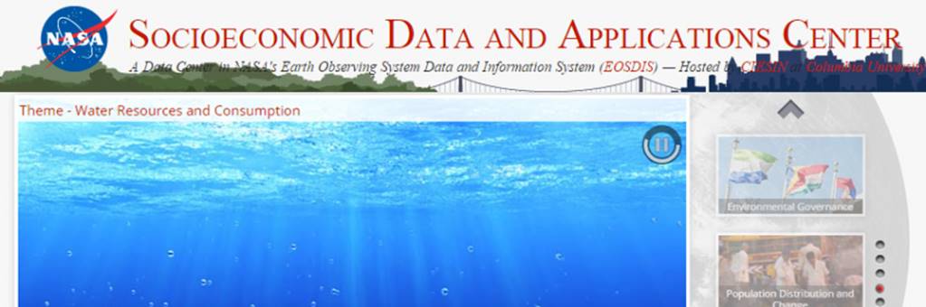 A blue water with a bridge in the background
Description automatically generated